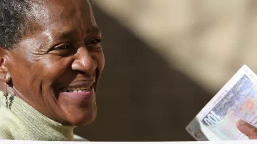 women holding cash money