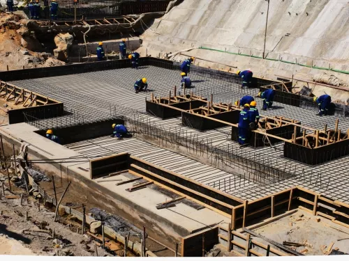 people talking at a water plant