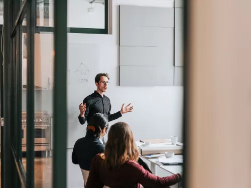 gopa employee presentiing infront of a group